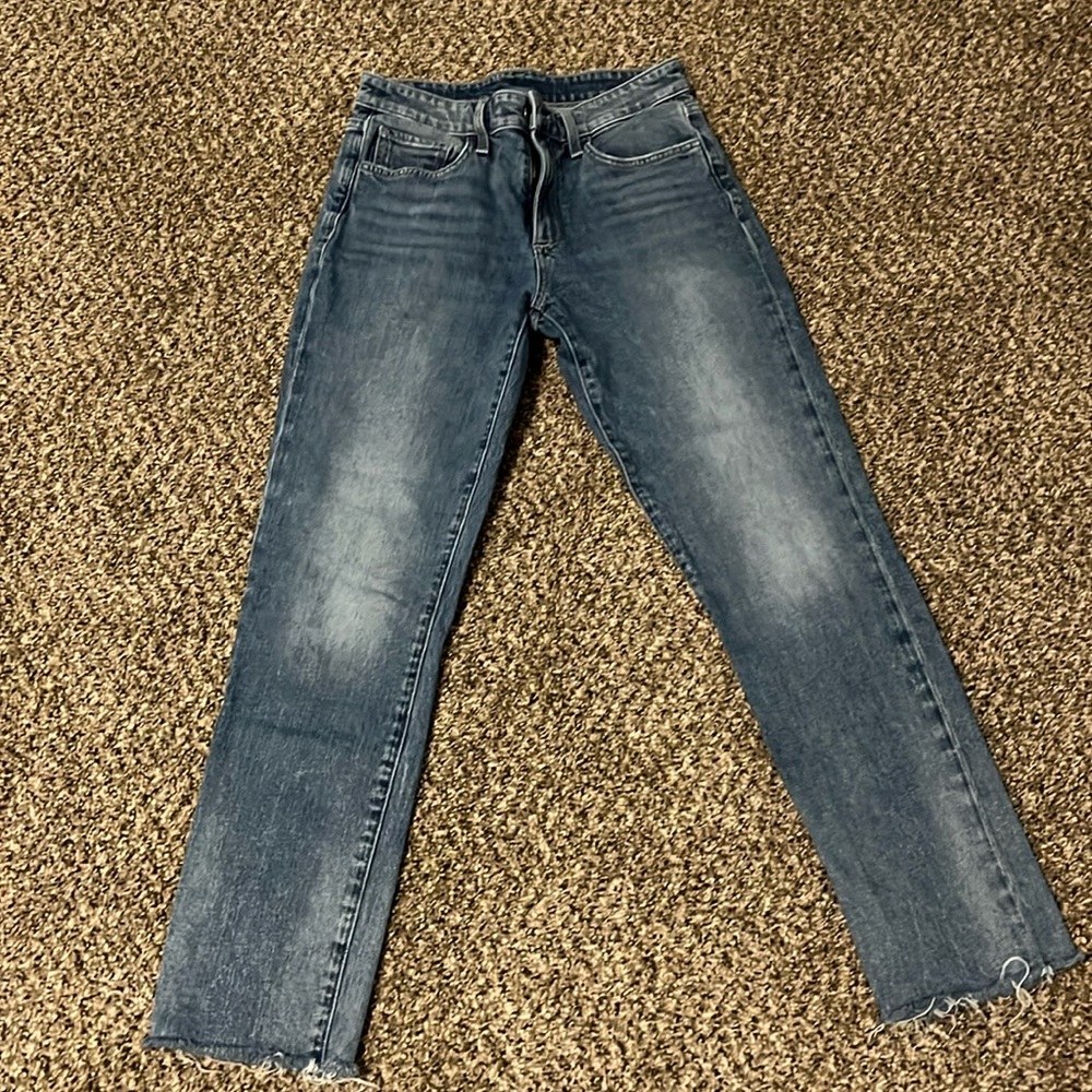 Straight leg Joe Jean with raw hem.